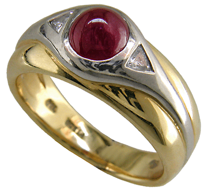 Platinum and gold ring with cabochon ruby and diamonds.