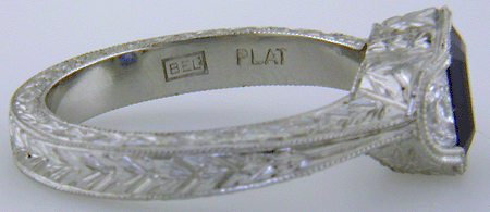 Close up of Bijoux Extraordinaire hallmark (BEL).