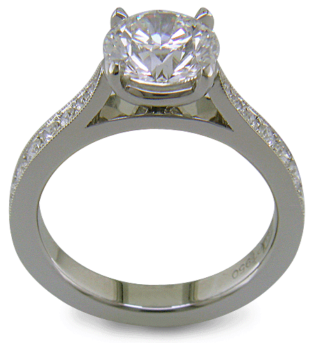 Custom diamond ring Note the thickness of the band throughout its 