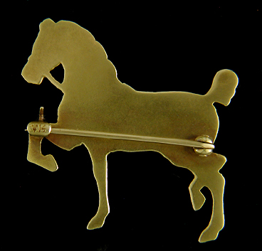 Sloan & Co. horse brooch with green enamel accent. (J9114)
