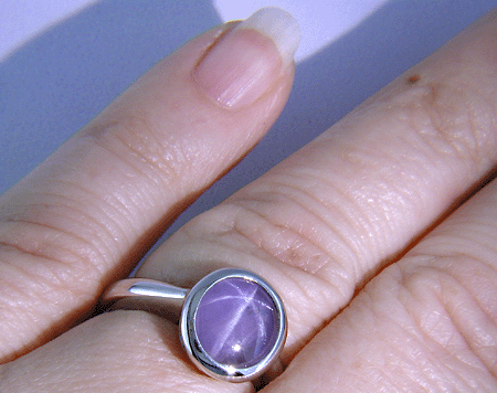 Purple star sapphire ring hand crafted in platinum