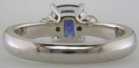 Square Cushion-cut Sapphire set with two round diamonds in a hand-crafted platinum ring. (J8599)