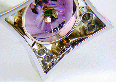 Amethyst torus and diamond pendant.