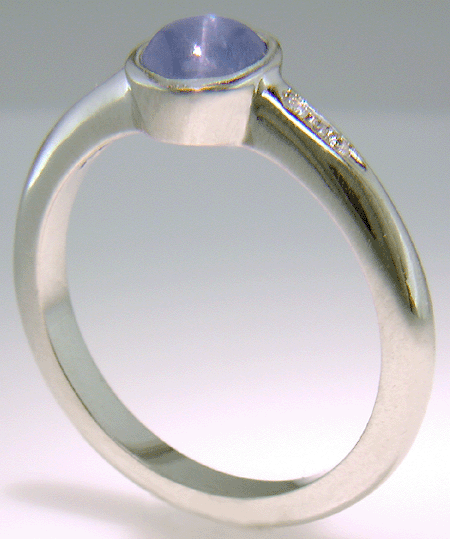 Star Sapphire and diamond platinum ring. (J7414)