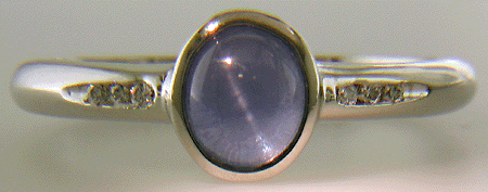 Star Sapphire and diamond platinum ring. (J7414)