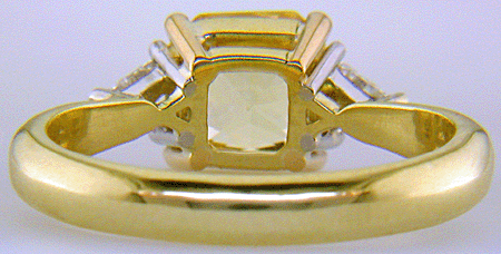 Inside view of square-radiant-cut Yellow Sapphire set with two brilliant-cut diamonds in a hand-crafted 18kt gold and platinum ring. (J8711)