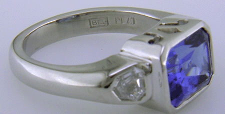 Close-up of Bijoux Extraordinaire hallmark (BEL).