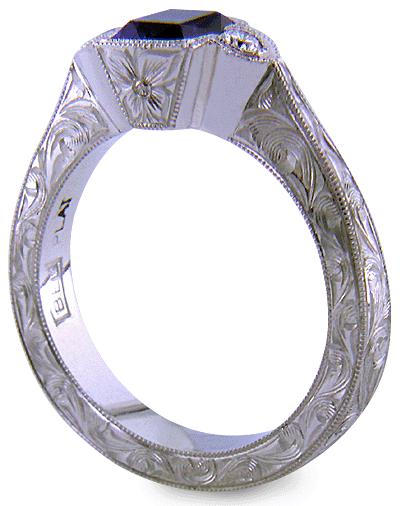 Tanzanite and diamond engraved ring. (J8708)