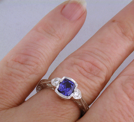 Tanzanite and diamond engraved ring. (J8708)