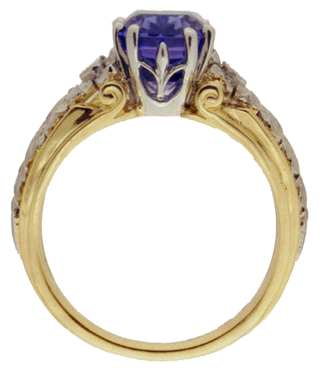 Side view of gold and platinum ring with tanzanite.