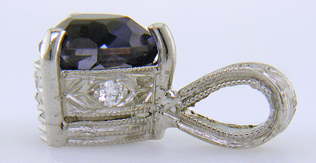 Side view of trillium benitoite pendant accented with with four diamonds.