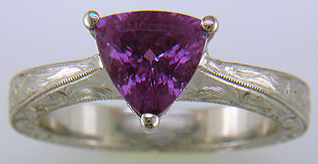 Hand engraved platinum ring with a trillium purple sapphire. (J8732)
