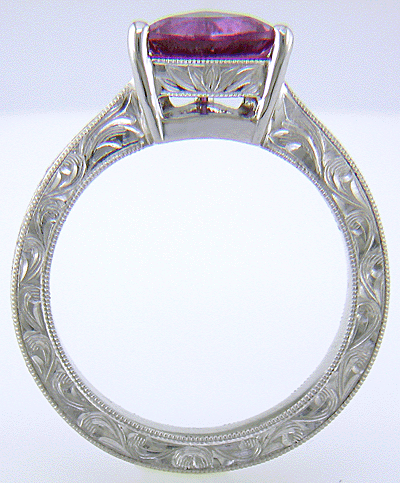 Hand-engraved platinum ring with a trillium purple sapphire. (J8732)