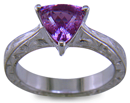 Hand-engraved platinum ring with a trillium purple sapphire. (J8732)