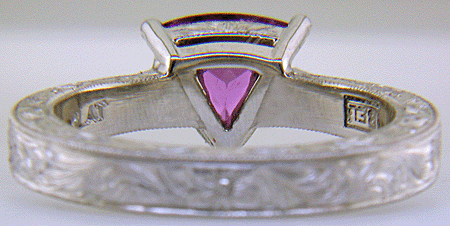 Hand-engraved platinum ring with a trillium purple sapphire. (J8732)