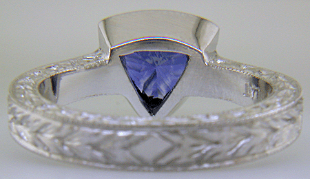 Inside of a hand-crafted, hand-engraved platinum ring. (J8707)