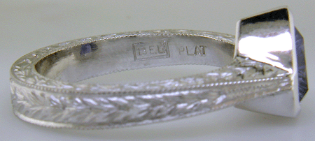 Close up of Bijoux Extraordinaire hallmark (BEL). (J8707)