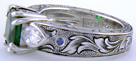 Close-up of Bijoux Extraordinaire hallmark (BEL).