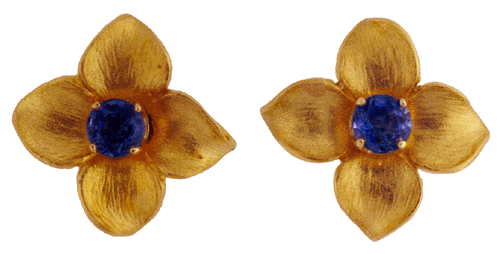 Sapphire studs with 18kt gold dogwood jackets.
