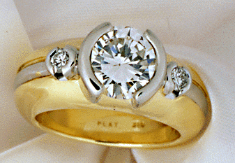 A striking platinum and gold diamond engagement ring.