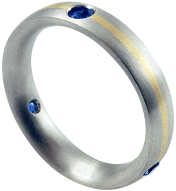 Sapphire wedding band in platinum with 18kt gold accent