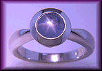 Star sapphire engagement ring custom crafted in platinum.