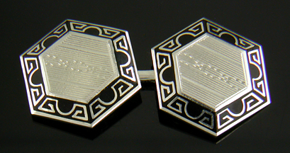 Art Deco white gold cufflinks with black enamel accents. (J8989)