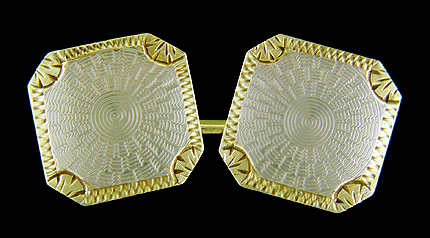 Elegantly engraved platinum and gold cufflinks. (J9231)