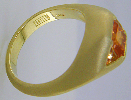 Close-up fo Bijoux Extraordinaire hallmark (BEL). (J8706)