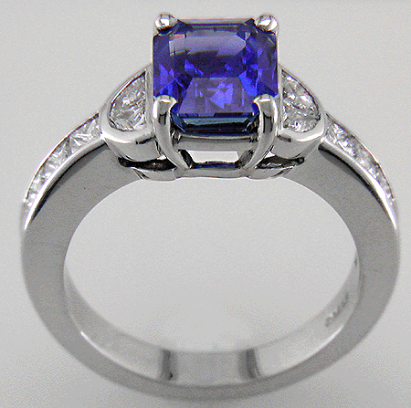 2.90ct emerald-cut sapphire and diamond ring in platinum.
