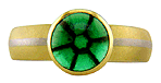 A gold and platinum ring set with a Trapiche Emerald.  (J7258)