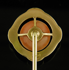 Brassler stickpin with glowing angle skin coral. (J9130)