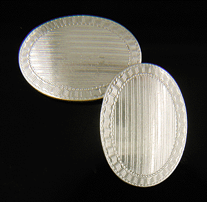 Carrington platinum and gold cufflinks. (J7484)