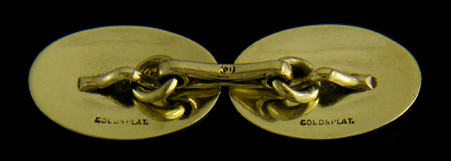 Carrington platinum and gold oval cufflinks. (J9034)