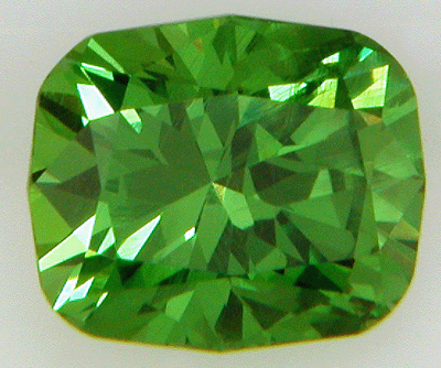 Cushion-cut Demantoid Garnet weighing 1.50 carats. (CS5447)