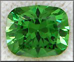 Cushion-cut Demantoid Garnet weighing 1.50 carats. (CS5447)