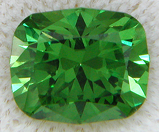 Cushion-cut Demantoid Garnet weighing 1.50 carats. (CS5447)