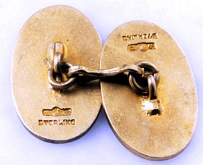 Rear view of quindecennial cufflinks. (J3116)