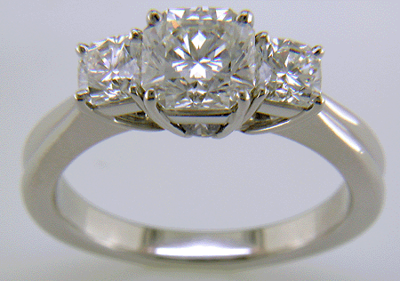 Three Flanders cut diamonds in a custom platinum ring.