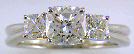 Three Flanders cut diamonds in a custom platinum ring.