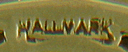 Close up of United Jewelers maker's mark. (J8733)