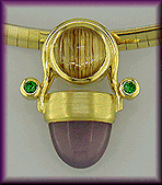 18kt gold pendant featuring holly chalcedony, rutilated quartz and tsavorite garnets.