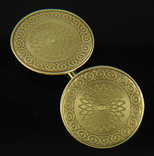 Huger 14kt gold engine-turned cufflinks. (J8457)