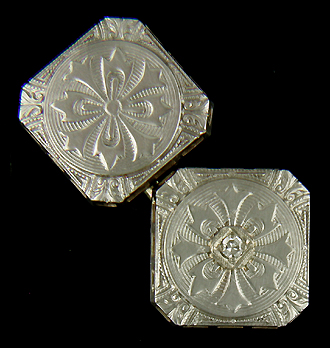 Antique white gold and diamond cufflinks. (J8978)