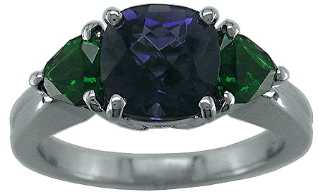 Iolite and tourmaline ring crafted in platinum.