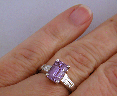 Lavender Sapphire set with tapered baguette diamonds in a handcrafted platinum ring. (J8527)