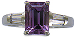 Lavender Sapphire set with tapered baguette diamonds in a handcrafted platinum ring. (J8527)