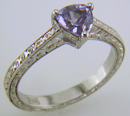 Platinum engraved ring with trillium lavender sapphire. (J6399)
