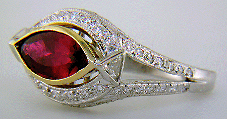 Rubellite tourmaline and diamond custom platinum ring.