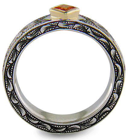 A beautifully hand-engraved ring set with fiery orange Manderin Garnets. (J8703)